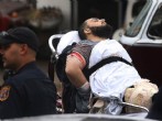 Ahmad Khan Rahami é levado em uma maca após troca de tiros com a polícia. Foto: Ed Murray/NJ Advance Media/AP